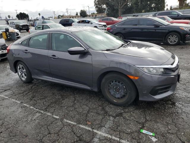 19XFC2F52JE001790 - 2018 HONDA CIVIC LX GRAY photo 4