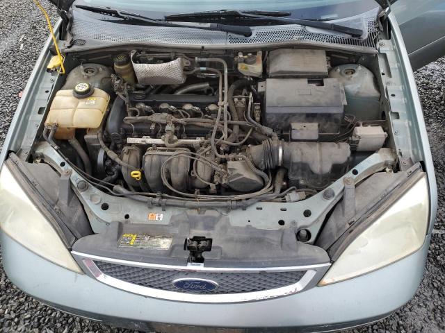 1FAFP34N15W271091 - 2005 FORD FOCUS ZX4 TURQUOISE photo 11