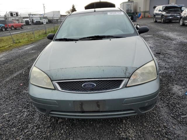 1FAFP34N15W271091 - 2005 FORD FOCUS ZX4 TURQUOISE photo 5