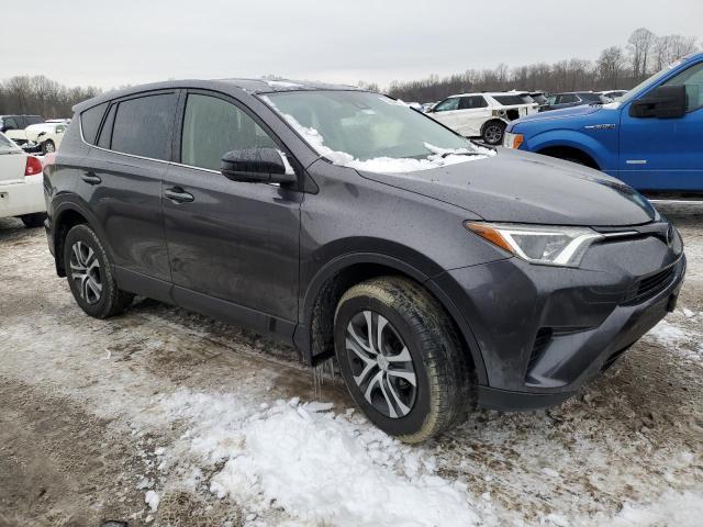 JTMBFREV8JJ218635 - 2018 TOYOTA RAV4 LE GRAY photo 4