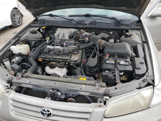 JT2BF22K6X0151557 - 1999 TOYOTA CAMRY LE TAN photo 11