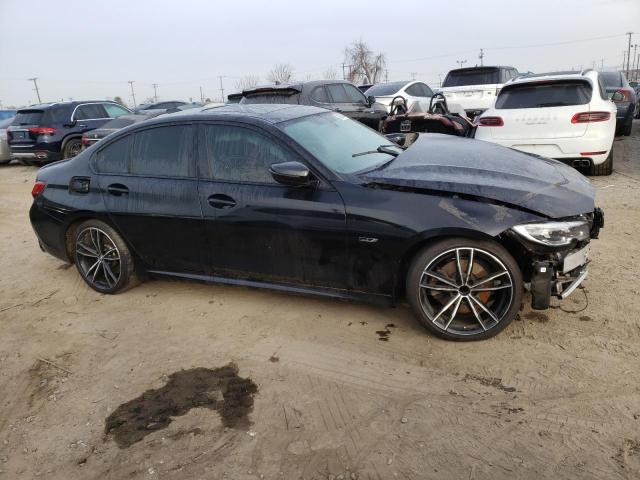 3MW5P7J02N8C60337 - 2022 BMW 330E BLACK photo 4