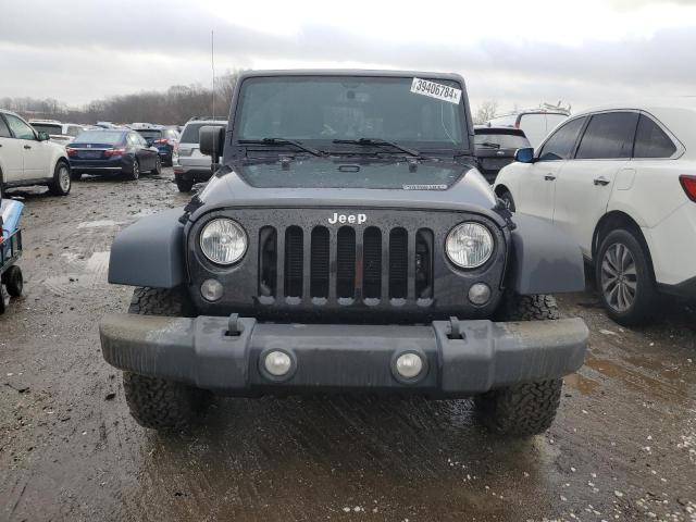 1C4BJWDG8GL101389 - 2016 JEEP WRANGLER U SPORT შავი ფოტო 5