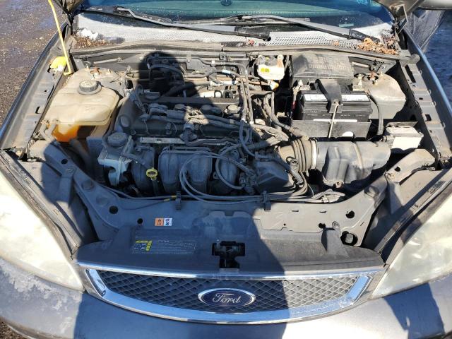 1FAFP31N97W326412 - 2007 FORD FOCUS ZX3 GRAY photo 11