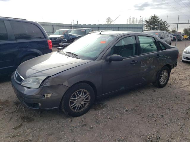 1FAFP34NX5W182961 - 2005 FORD FOCUS ZX4 GRAY photo 1