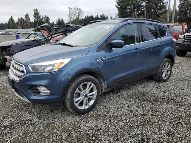 1FMCU0GD3JUB46828 - 2018 FORD ESCAPE SE BLUE photo 1