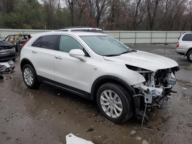 1GYAZAR46PF217057 - 2023 CADILLAC XT4 LUXURY WHITE photo 4