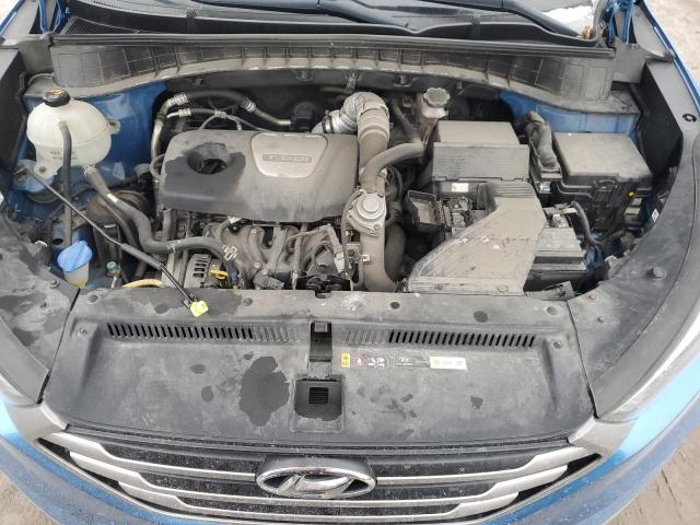 KM8J33A21HU354915 - 2017 HYUNDAI TUCSON LIMITED BLUE photo 11