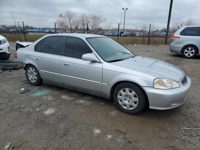 1HGEJ6571XL001597 - 1999 HONDA CIVIC LX SILVER photo 4