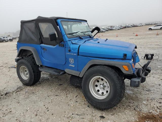 1J4FA49S62P765737 - 2002 JEEP WRANGLER / SPORT BLUE photo 4