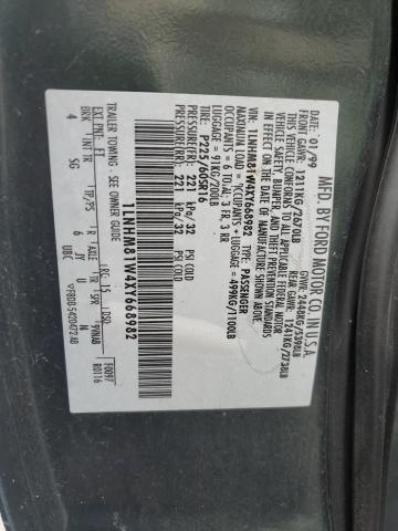 1LNHM81W4XY668982 - 1999 LINCOLN TOWN CAR EXECUTIVE GREEN photo 12