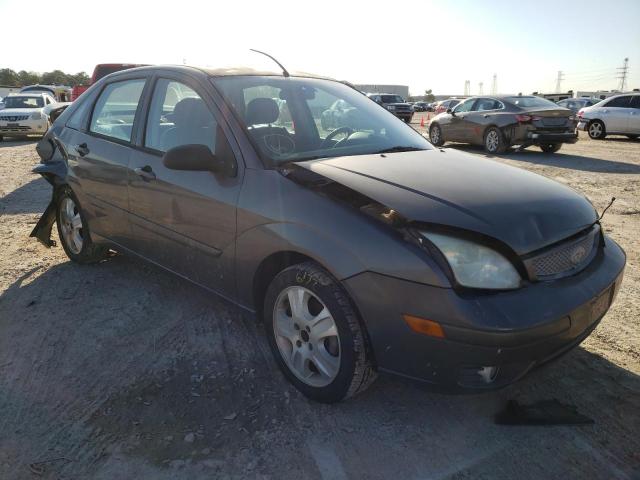 1FAHP38Z25W183611 - 2005 FORD FOCUS ZX4 ST GRAY photo 1