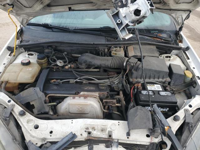 3FAFP31314R120272 - 2004 FORD FOCUS ZX3 WHITE photo 11