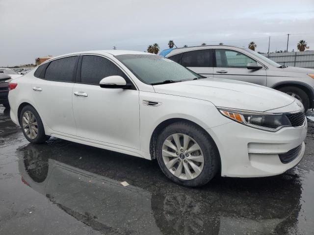 5XXGT4L32GG082390 - 2016 KIA OPTIMA LX WHITE photo 4