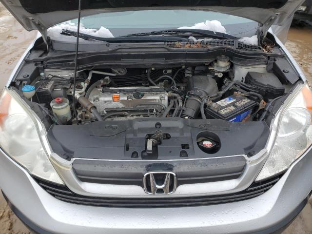 5J6RE48319L036669 - 2009 HONDA CR-V LX SILVER photo 12