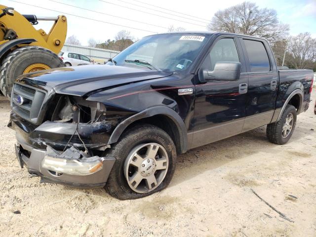 1FTPW14586KC82622 - 2006 FORD F150 FX4X4 SUPERCREW BLACK photo 1