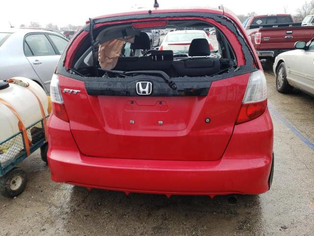 JHMGE88259S070310 - 2009 HONDA FIT RED photo 6