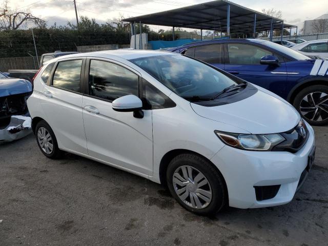 JHMGK5H56GX038256 - 2016 HONDA FIT LX WHITE photo 4