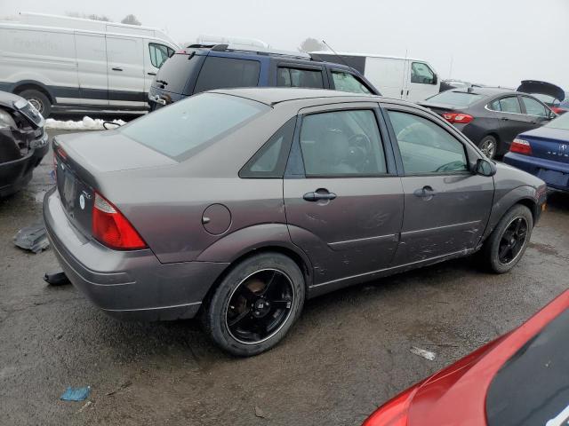 1FAHP34N96W194416 - 2006 FORD FOCUS ZX4 GRAY photo 3