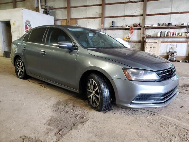 3VWDB7AJ5HM318634 - 2017 VOLKSWAGEN JETTA SE GRAY photo 4