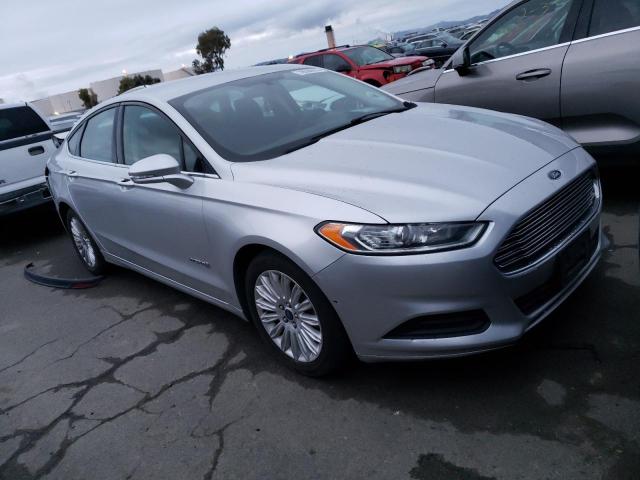 3FA6P0LU6FR128679 - 2015 FORD FUSION SE HYBRID SILVER photo 4