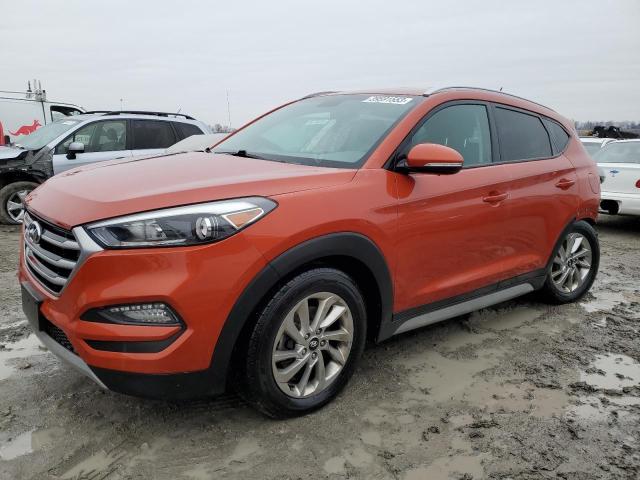 KM8J33A20HU372029 - 2017 HYUNDAI TUCSON LIMITED ORANGE photo 1