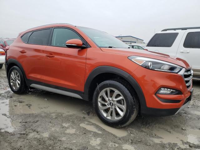 KM8J33A20HU372029 - 2017 HYUNDAI TUCSON LIMITED ORANGE photo 4