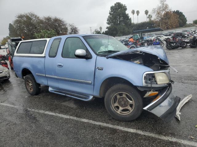 1FTDX17WXVKB91726 - 1997 FORD F150 BLUE photo 4