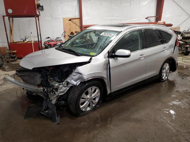 2HKRM4H76CH632030 - 2012 HONDA CR-V EXL SILVER photo 1