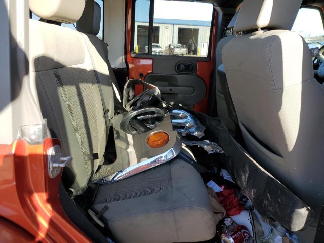 1J4GA59169L759018 - 2009 JEEP WRANGLER U SAHARA ORANGE photo 10