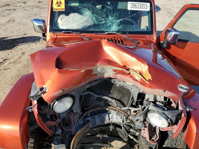 1J4GA59169L759018 - 2009 JEEP WRANGLER U SAHARA ORANGE photo 11