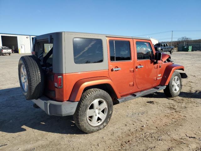 1J4GA59169L759018 - 2009 JEEP WRANGLER U SAHARA ORANGE photo 3