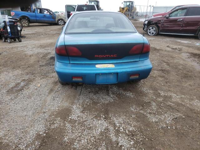 1G2JB5249W7598900 - 1998 PONTIAC SUNFIRE SE BLUE photo 6