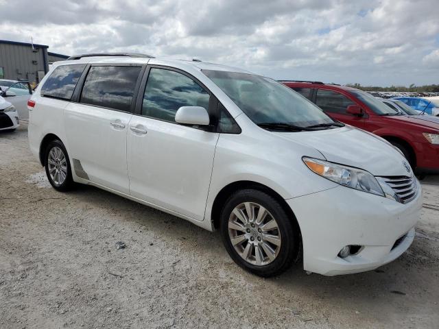 5TDDK3DC9BS015484 - 2011 TOYOTA SIENNA XLE WHITE photo 4