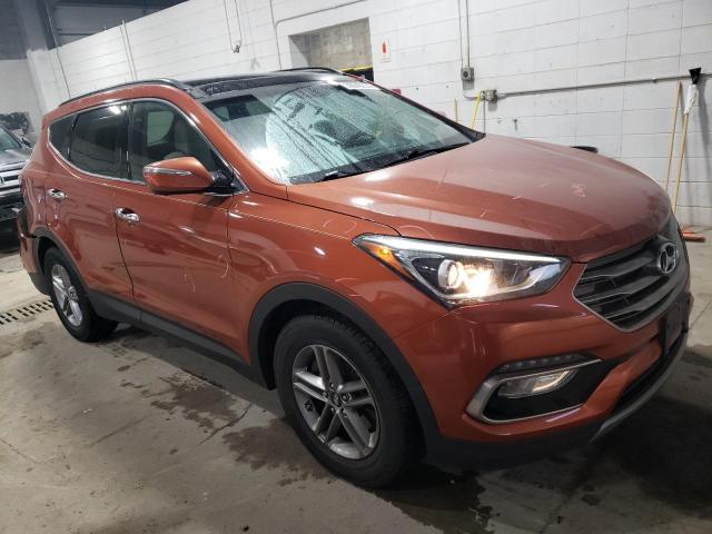 5XYZUDLB2HG386670 - 2017 HYUNDAI SANTA FE S ORANGE photo 4