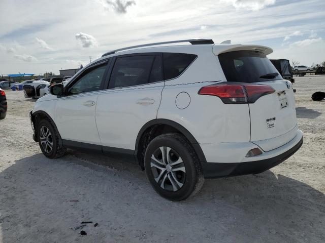 JTMZFREV7JJ212873 - 2018 TOYOTA RAV4 LE WHITE photo 2