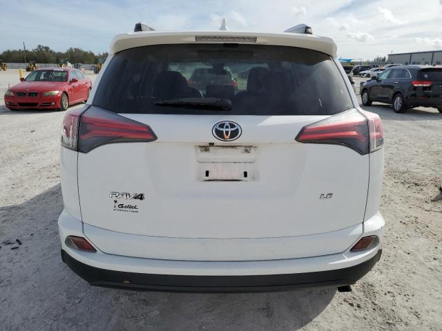 JTMZFREV7JJ212873 - 2018 TOYOTA RAV4 LE WHITE photo 6