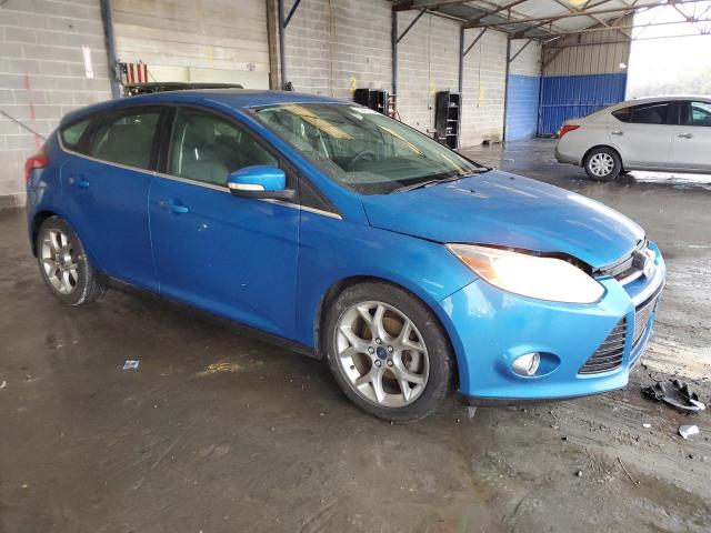 1FAHP3M2XCL298318 - 2012 FORD FOCUS SEL BLUE photo 4