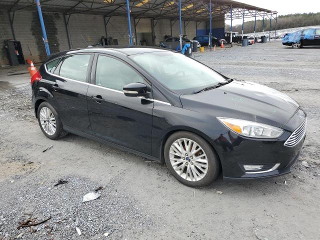 1FADP3N28GL222597 - 2016 FORD FOCUS TITANIUM BLACK photo 4