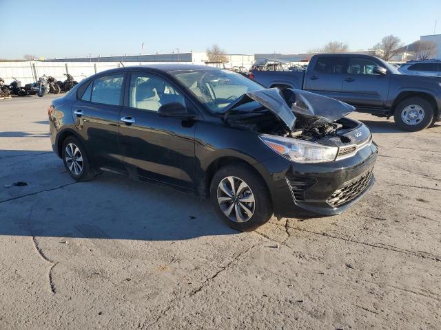 3KPA24AD1PE531717 - 2023 KIA RIO LX BLACK photo 4