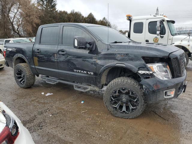 1N6AA1E59KN523614 - 2019 NISSAN TITAN SV BLACK photo 4