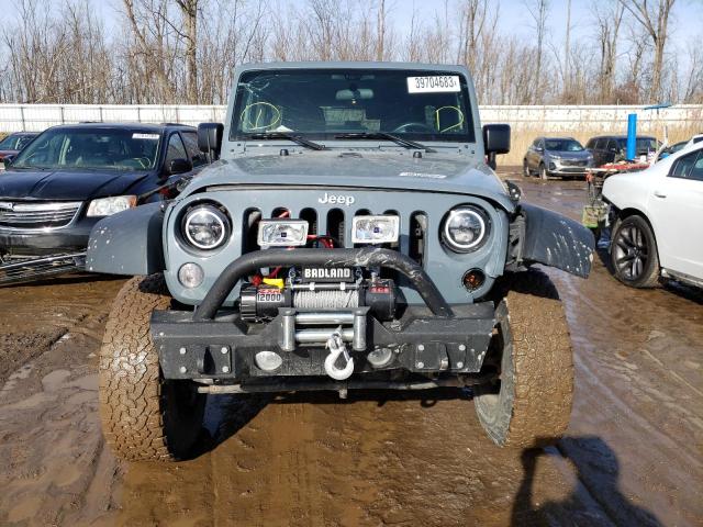 1C4BJWDG5FL528978 - 2015 JEEP WRANGLER U SPORT GRAY photo 5