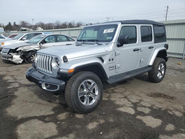 1C4HJXEG4NW260999 - 2022 JEEP WRANGLER U SAHARA SILVER photo 1