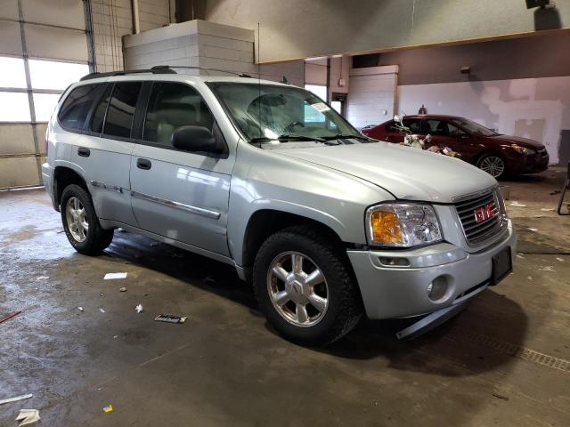 1GKDS13S972184629 - 2007 GMC ENVOY SILVER photo 4