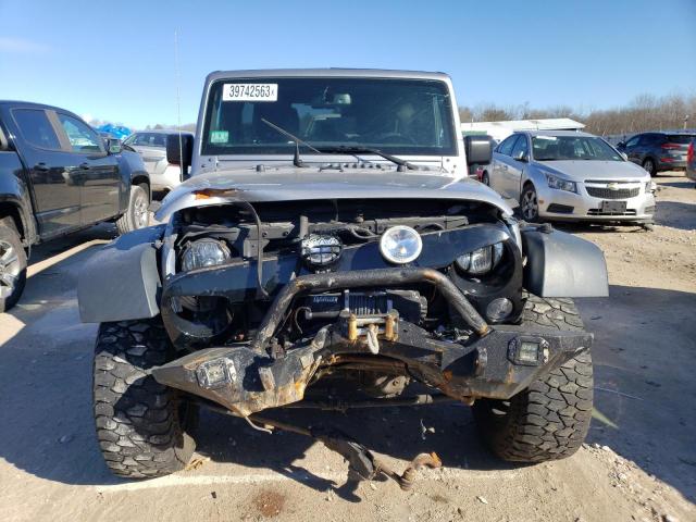 1C4BJWDG3FL567990 - 2015 JEEP WRANGLER U SPORT SILVER photo 5