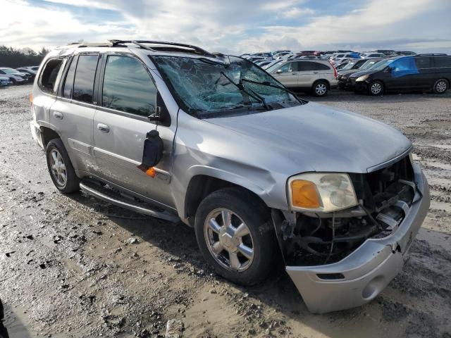 1GKDT13S342287098 - 2004 GMC ENVOY SILVER photo 4