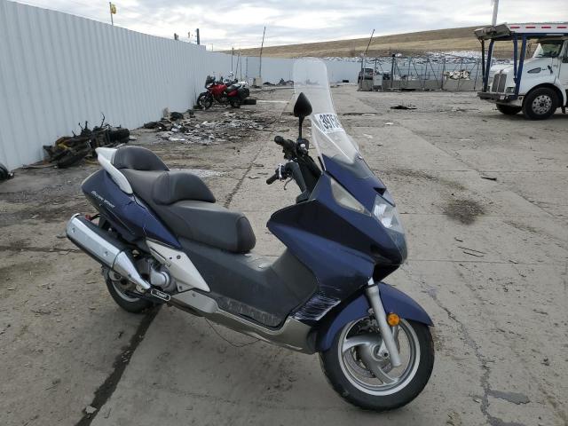 JH2PF01406K300155 - 2006 HONDA FSC600 A BLUE photo 1