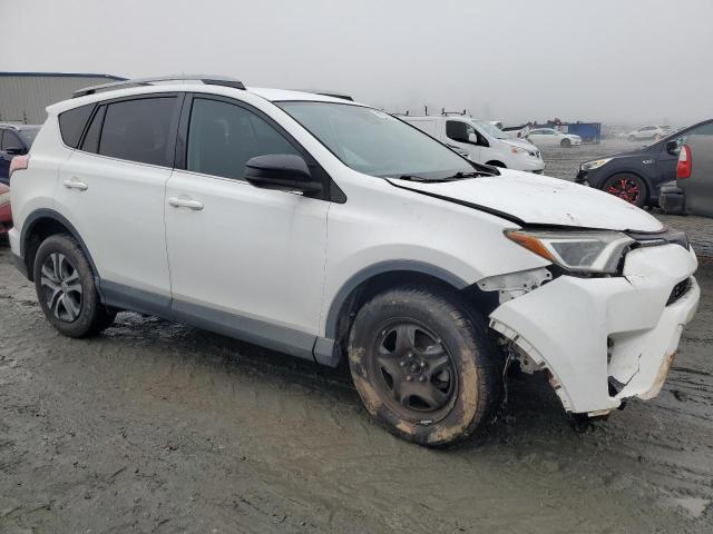 2T3ZFREV9HW346652 - 2017 TOYOTA RAV4 LE WHITE photo 4