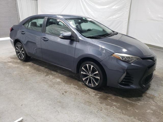 5YFBURHE4HP586706 - 2017 TOYOTA COROLLA L GRAY photo 4