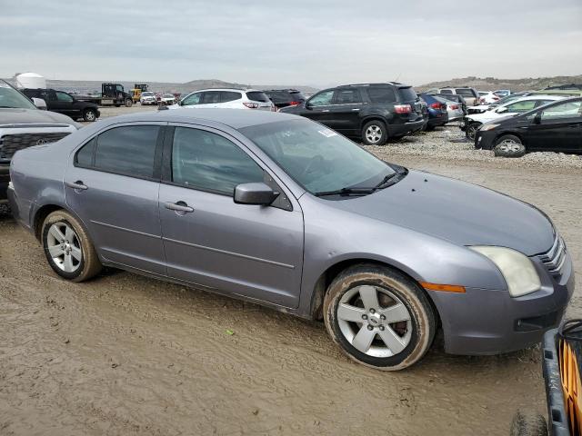 3FAHP07Z27R128761 - 2007 FORD FUSION SE GRAY photo 4